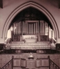 Early photo showing the pipe organ
